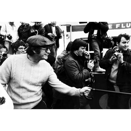 Steve McQueen carrying a cane at Le Mans in France Photo