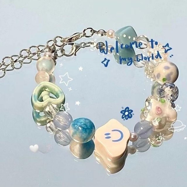 Pulsera de mariposa con diseño de nicho, pulsera con temperamento y sensación, pulsera con cuentas de estrella y sonrisa, pulsera con degradado única para mujer