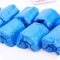 thumbnail image 2 of Cubierta desechable para zapatos, 100 unidades, cubierta impermeable de plástico grueso para lluvia para hombres y mujeres, 2 of 5