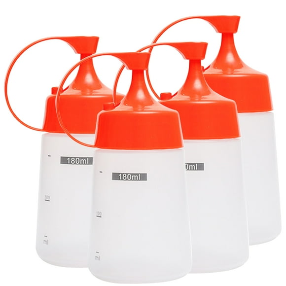 4 botellas reutilizables para condimentos, miel, mostaza y mermelada.