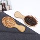 thumbnail image 4 of Soidarity Cepillo de pelo de bambú de dientes anchos amarillos de madera de bambú, masaje suave compacto y ligero para el cabello masajeadores Negro, 4 of 6