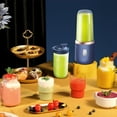 thumbnail image 1 of Exprimidor portátil de electrodomésticos para hacer jugos. Viene con taza de viaje y tapa. Cuchillas de acero inoxidable para una licuadora potente., 1 of 8