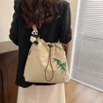 thumbnail image 5 of Nuevos bolsos cruzados de nailon de gran capacidad con cordón y bordados, tendencia de venta caliente 2024, bolsos de mano versátiles, bolsos de hombro para viajes diarios, 5 of 5