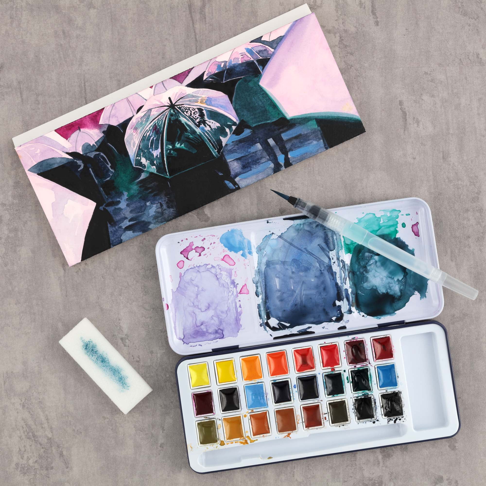 SoHo Urban Artist Semi-Moist Watercolor Set - Professional Watercolor Paint Set with 24 Half Pans, Brush Pen and Sponge - Compact and Portable Watercolor Kit - Easy to Lift Colors