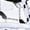 White, variant on Lightweight Breathable Sneakers for Men Featuring a Geometric Black And White Design, Ideal for Running, Walking, And Training. They Come with a Lace-Up Closure, MD Sole, And Fabric Upper