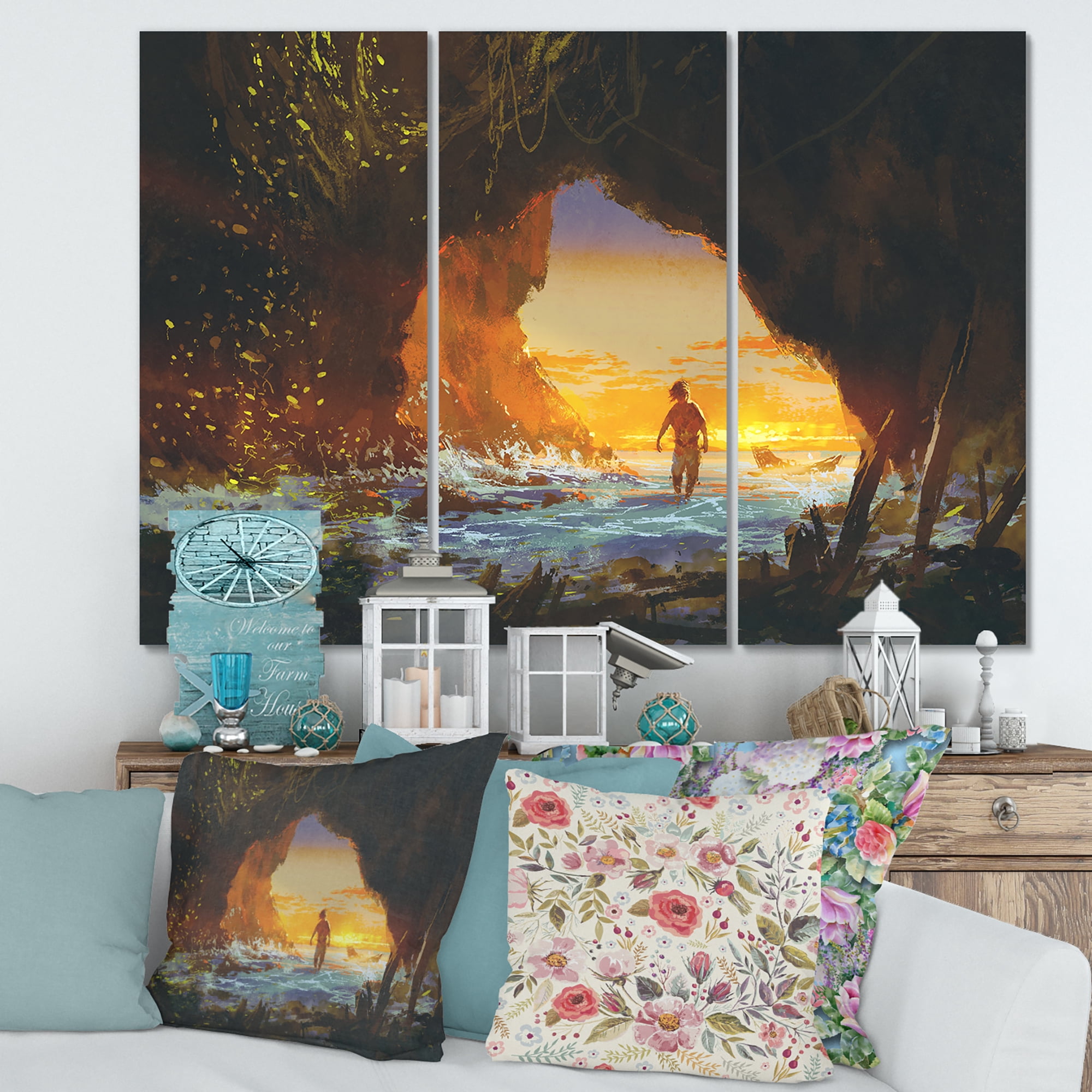 Designart ' The Sea Cave At Sunset With The Man Walking In ' Nautical & Coastal Canvas Wall Art Print