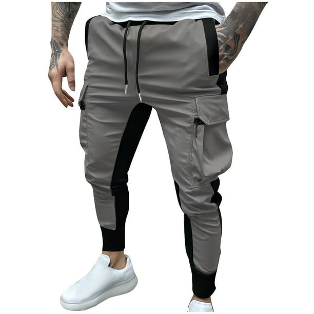 Puntoco Pantalones elásticos de color sólido con cremallera y múltiples bolsillos para hombre, cintura elástica con cordón para ajustar los pies