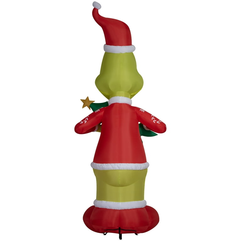 The Grinch Airblown Seuss Animated Grinch Putting Santa Hat On