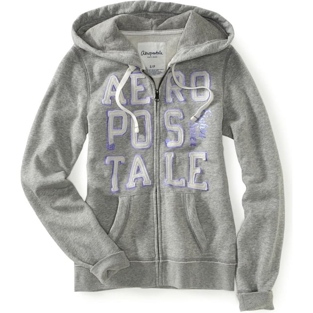 aeropostale sudadera con capucha y cremallera completa aero stacked 87 para mujer, gris, xs aeropostale sudadera frontal con cremallera central y capucha de cordón blanco; bolsillos tipo canguro, gran logotipo aplicado en relieve 'AEROPOSTALE' estilo stacked 87 con serigrafías de contorno claro, puños y basta con costura visible. adecuada como chamarra casual ligera.
