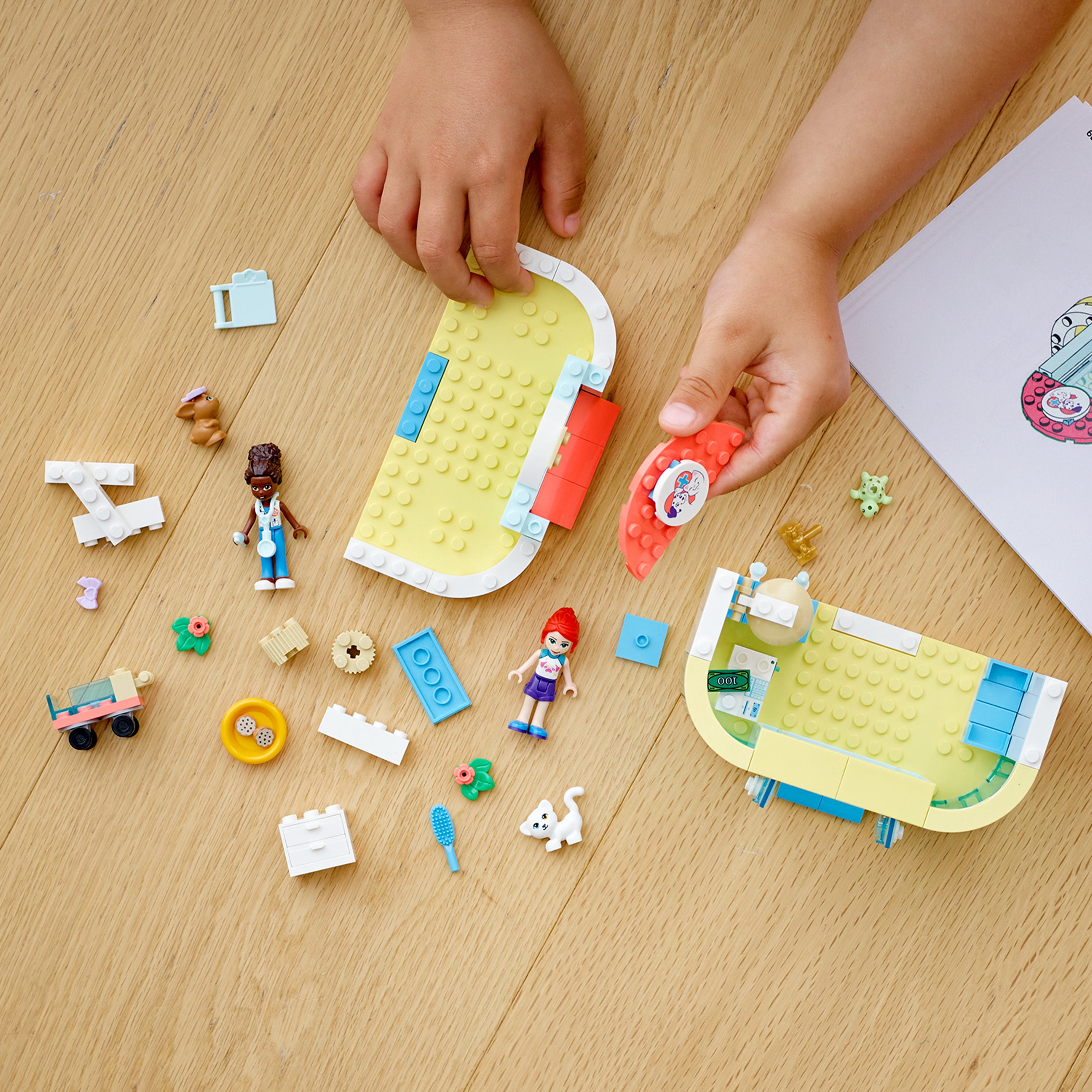 LEGO Friends Pet Clinic 41695 Building Kit; With 2 Mini-Dolls Including Mia, Plus Cat and Rabbit Toys; Creative Birthday Gift for Kids Aged 4 and up (111 Pieces)