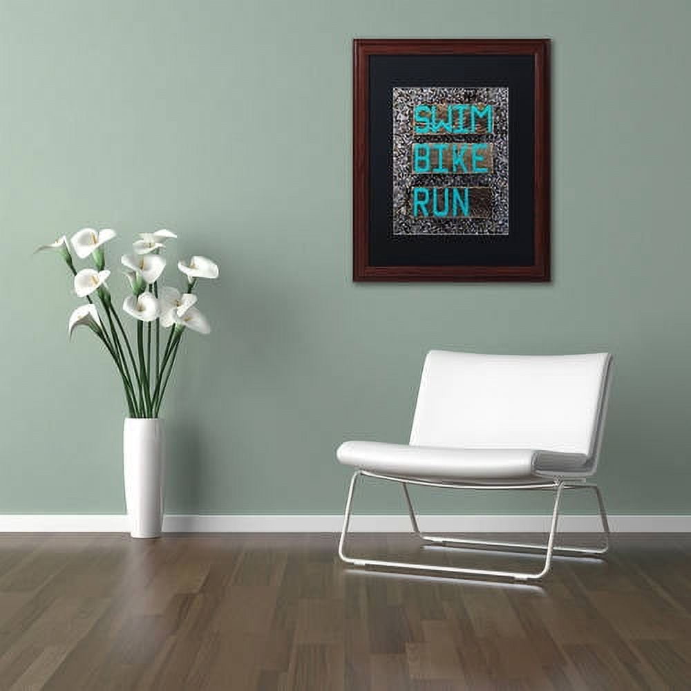 Trademark Fine Art 'The Triathlete' Canvas Art by Nicole Dietz, Black Matte, Wood Frame
