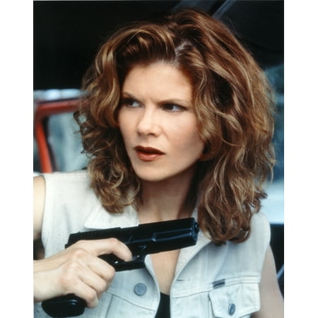 Lolita Davidovich Looking Away with Pistol Close Up Portrait Photo