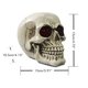 thumbnail image 2 of Estatua de cabeza de esqueleto de Halloween con luces LED, novedad, figura de cabeza de esqueleto de resina, accesorios para casa encantada, escritorio de mesa, decoración para el hogar y la Oficina, 2 of 6