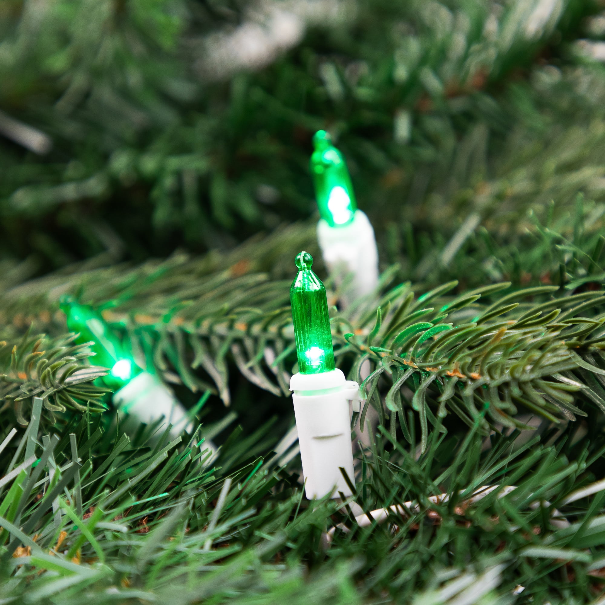 Set of 50 Green LED Mini Christmas Lights 4" Spacing - White Wire