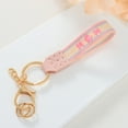 thumbnail image 1 of Short Fabric Embroidered Keychain for Mother's Day, Handmade Crochet Design with Leather Details, Measuring 15.5x3x1cm, Ideal as Key Accessory or Gift, 1 of 6