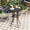 Black, variant on VOXBIN 28" Round Outdoor Bar Table with Adjustable Umbrella Hole Modern Metal Frame for Balcony ,Graywood