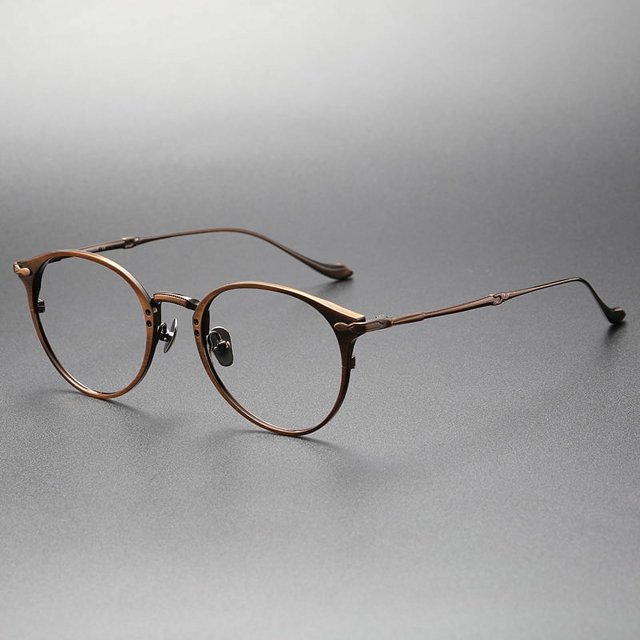 Las gafas de miopía para hombre con montura de titanio puro se pueden equipar con la cantidad de gafas azules.