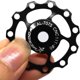 thumbnail image 4 of 2 uds bicicleta reductor trasero engranaje reductor polea guía de rueda rodamiento de cerámica accesorios reductores de bicicleta (negro), 4 of 4