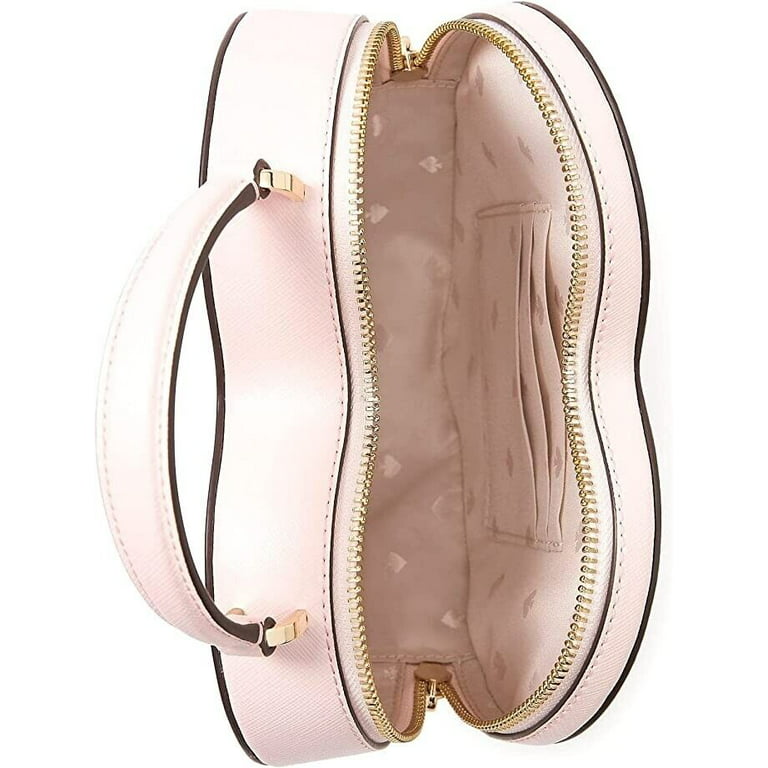 Light pink Kate Spade heart purse. Very spacious and