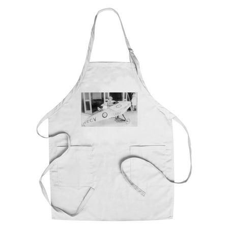 - Children in a Child-Size Replica of Spirit of St. Louis Plane (Cotton/Polyester Chef's Apron)