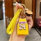 thumbnail image 1 of Llavero con diseño de estrella de baloncesto, gel de sílice moldeado en 3D, llavero portátil para coche, colgante para hombre y niño, camiseta amarilla n.° 24, 1 of 1