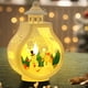 thumbnail image 4 of Portavelas de Navidad con luces de viento | Adornos decorativos de luz nocturna de aleación, diseño de copo de nieve, regalos festivos de vacaciones, decoración de mesa elegante, lámpara de acento, 4 of 6