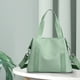 thumbnail image 1 of Xihbxyly Bolso Bandolera de Gran Capacidad, Nailon Impermeable, Múltiples Bolsillos Interiores, Ideal para Viajes, Fitness y Compras, Práctico Bolso de Hombro, Tamaño 34 X 30 X 14 Cm., 1 of 6