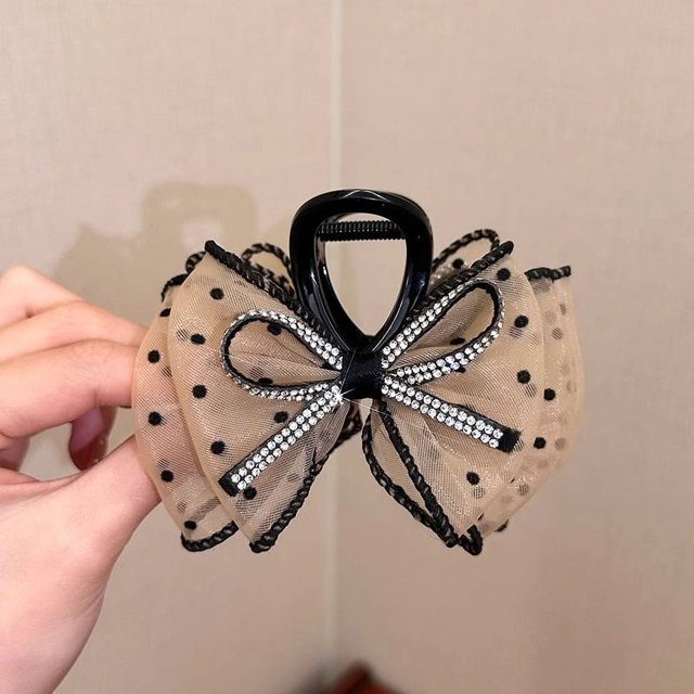 Elegante horquilla de alta gama con forma de tiburón y pinza para el pelo de plumas negras grandes para mujer