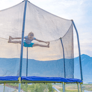 Skywalker Trampolines 12-Foot Round Trampoline with Safety Enclosure Net & Spring Pad - Heavy Duty Outdoor Trampoline for Kids & Adults, Rust-Resistant Steel Frame
