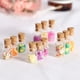 thumbnail image 1 of Casa de muñecas Mini comida Juego Accesorios Frutas enlatadas de vidrio Modelo en miniatura Pendientes creativos Accesorios, 1 of 5
