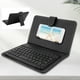 thumbnail image 4 of Teclado Bluetooth para teléfono móvil Ticfox en idioma tailandés con cubierta de cuero integrada, 4 of 12