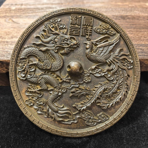 Antique-style dragon and phoenix bronze mirror disc with stand, a decorative craft item for home living room.
