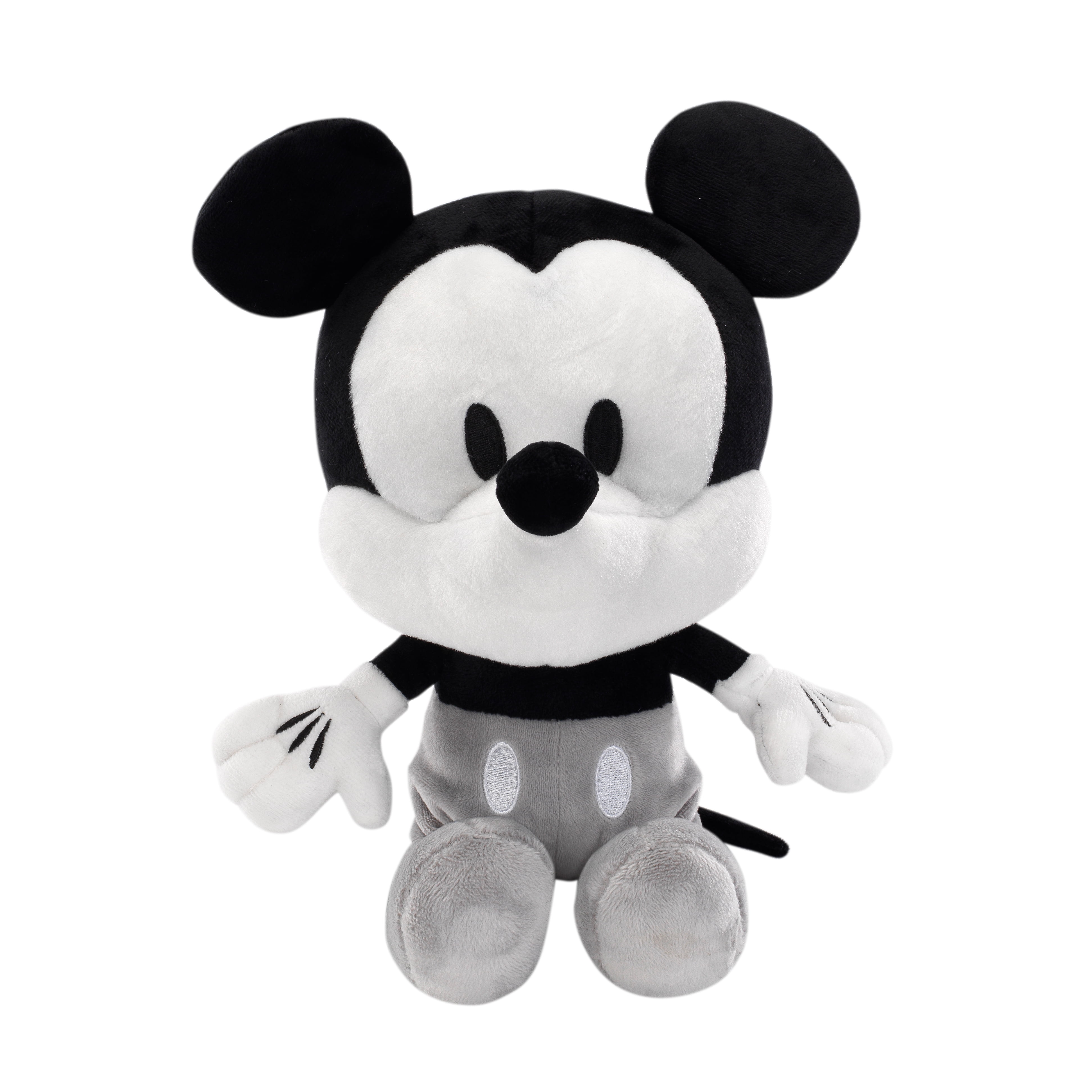 black and white plush dog