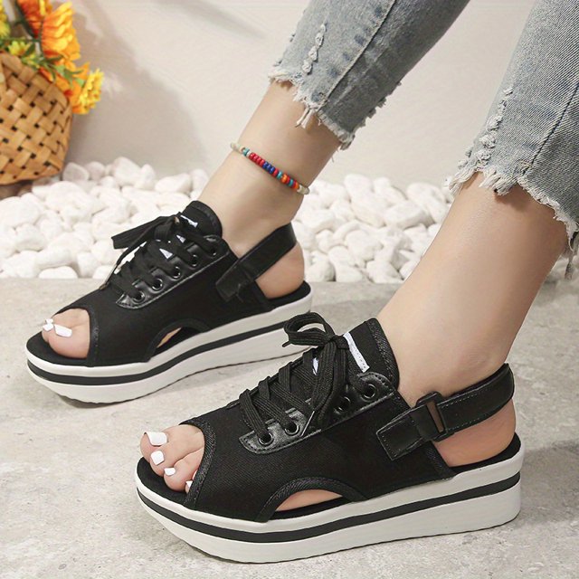 Elegantes sandalias de plataforma con talón abierto para mujer: corte de punta abierta, cordones y cierre de gancho y bucle para mayor comodidad y estilo.