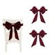 thumbnail image 1 of Funda de silla con lazo rojo navideño y correas decorativas para el respaldo. Ideal para decoración navideña., 1 of 9