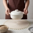 thumbnail image 4 of REGALWOVEN Rustic Placemats 6 Pack Round Woven Placemats for Dining Table Decor Indoor Outdoor Washable Kitchen Table Mat Wipe Clean Beige 15x15inch, 4 of 6