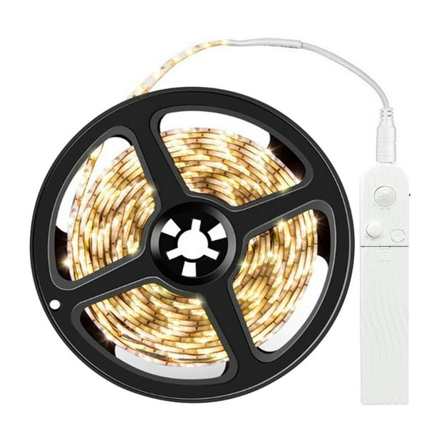 Tira LED inteligente con sensor de movimiento, ideal para cocinas, armarios y dormitorios, resistente al agua, color cálido, 60 LEDs por metro, incluye batería interna recargable y adhesivo.