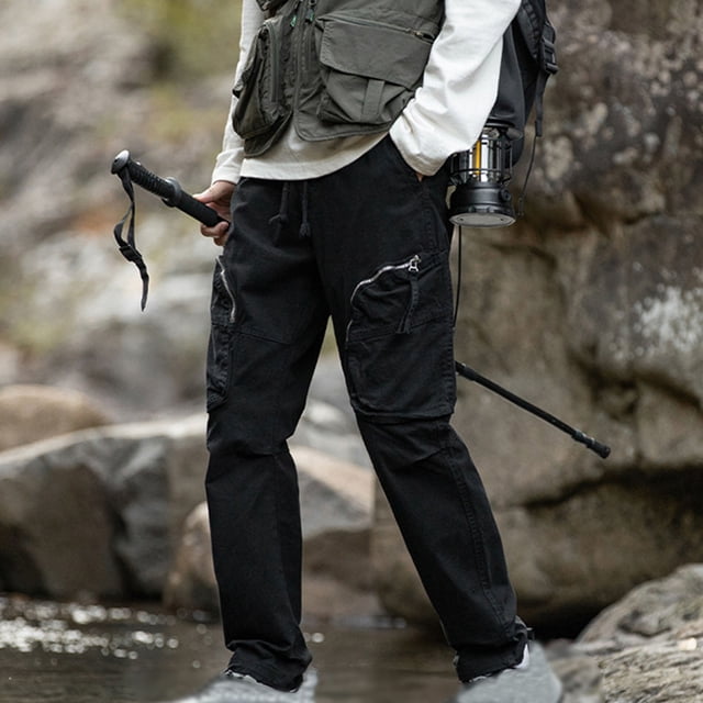 Pantalones largos de moda para hombre, casuales, de color sólido, con bolsillos y cremallera, cintura elástica, de poliéster.