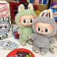 thumbnail image 4 of Modelo flocado de juguete, figura de Anime, caja ciega Labubu, colgante de la serie con asiento, llavero de réplica de monstruo Kawaii, juguete, regalo de cumpleaños, 4 of 5