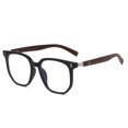 thumbnail image 1 of Las gafas retro anti-azules con patas de madera son simples y transparentes, hechas de TR., 1 of 5