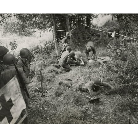 Doctors And Medics Giving First Aid To A Combat Engineer Injured By A ...