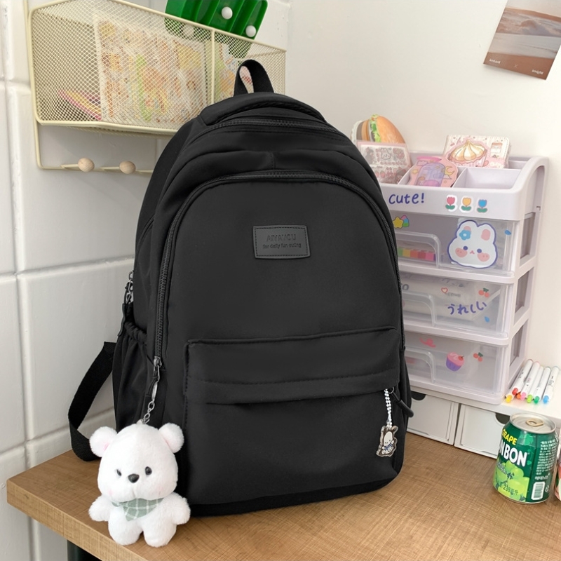 Student Japanese large-capacity backpack Teenagers simple and versatile backpack Unisex polyester material Doll decoration