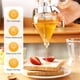 thumbnail image 5 of Dispensador de miel sin goteo, tarro de miel con soporte, elegante diseño de panal, 2 uds., 5 of 8
