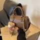 thumbnail image 2 of Bolsos de mano coreanos para mujer, bolso Boston retro de color sólido, bolso de hombro de alta gama, 2025, 2 of 5
