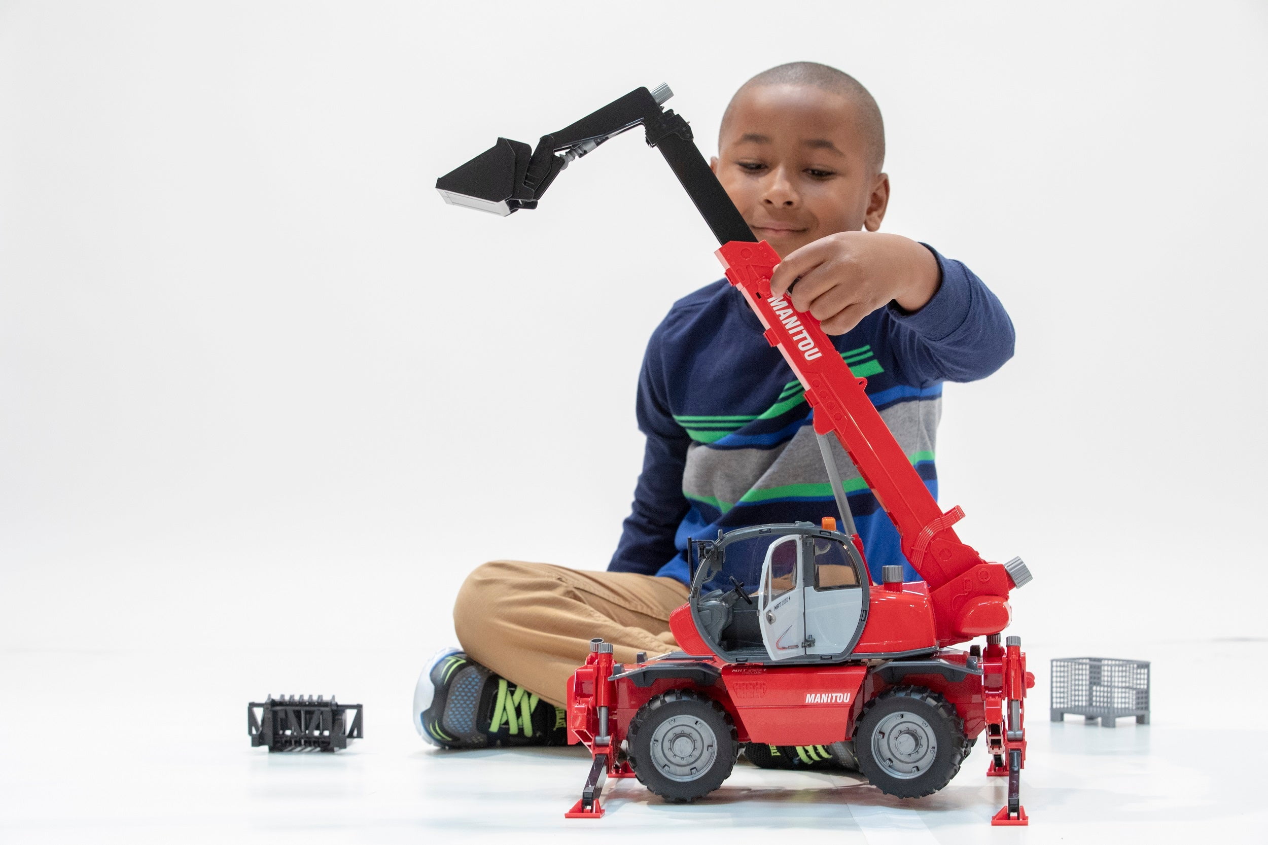 Bruder Toys Manitou Telehandler MRT 2150 Red in Macao at MOP 885 Rating 4