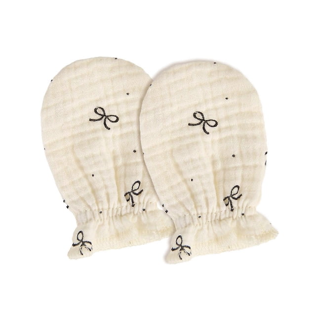 newborn not scratch hand protectors cotton mittens breathable washable baby gloves comfortable for delicate skin care multicolor centered pair of cream muslin cotton mittens with black bow and dot prints, closed-top design with elasticated wrists, approx. 9x7cm (4x3 in), breathable washable fabric suitable for newborns 0–24 months and helps prevent accidental face scratches during sleep; often used to keep tiny hands warm on outings.