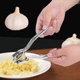 thumbnail image 4 of Picadora de ajo,Prensa de ajo de acero inoxidable para cocina Trituradora de ajo Estándares líderes en la industria, 4 of 8