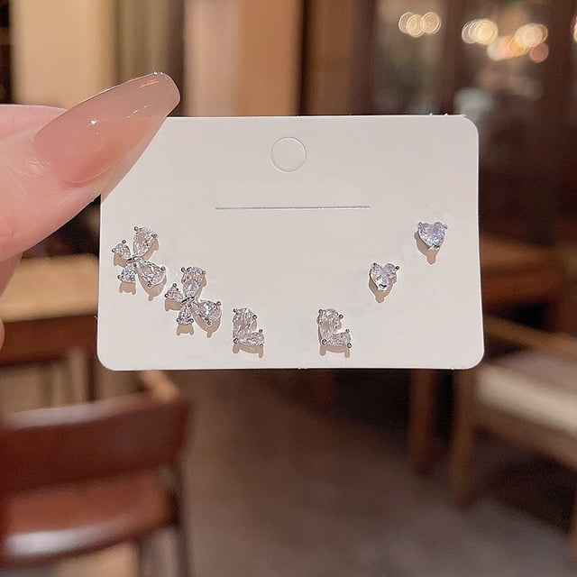 S925 Aguja de plata Exquisito traje de oreja de circón Pequeño pendiente de botón Ligero de lujo Nicho Todo fósforo Elegantes pendientes de perlas Pendientes de mujer