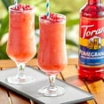 thumbnail image 2 of Torani Pomegranate Flavoring Syrup Plastic 750 mL with Bonus Squeeze Pump, 2 of 3