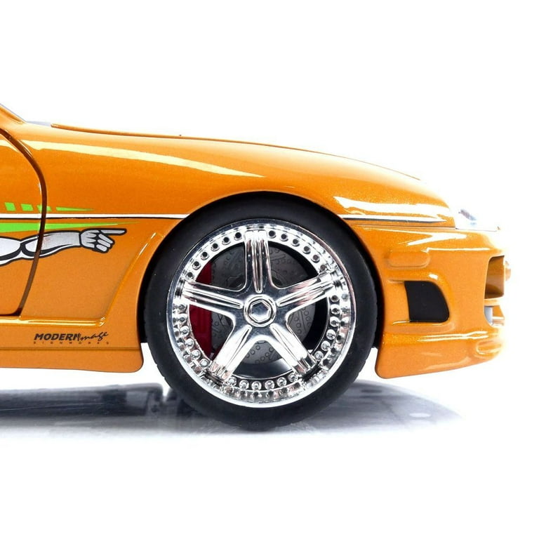 1995 Toyota Supra Orange Metallic with Lights and Brian Figurine